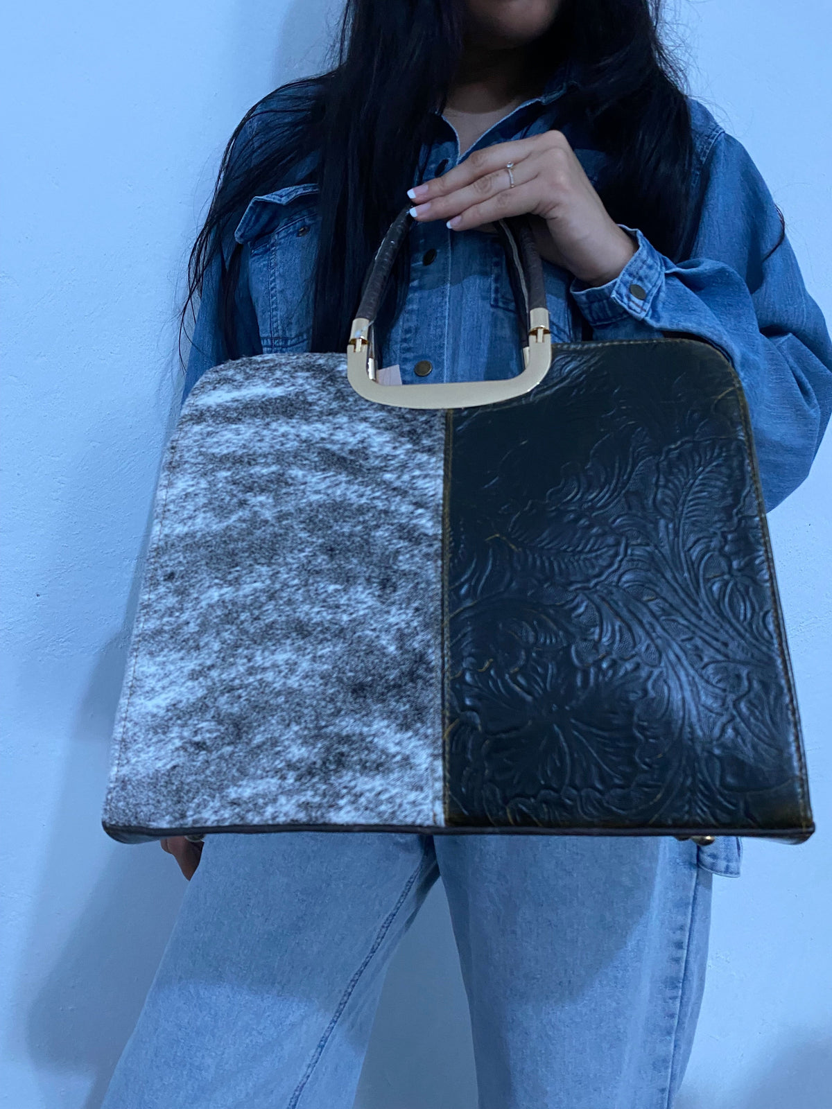 Bolsa artesanal con etiqueta piel 100% genuina